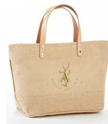 Khaki small jute tote bag with leather handles and zipper