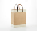 Khaki jute market tote with cotton accent panel and leather handles