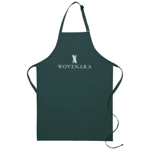 Hunter green butcher apron with center divided pocket and Wovenara logo print sample
